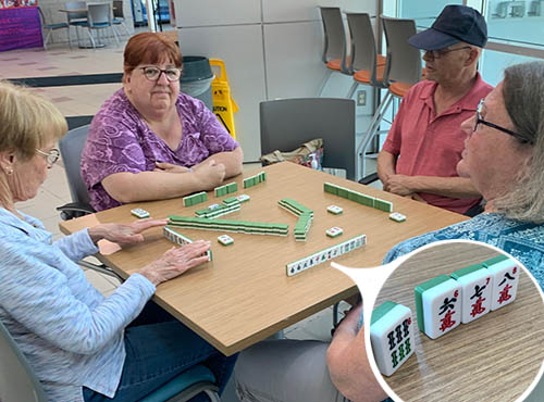 Members Playing Mahjong